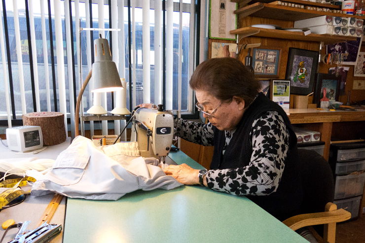 Sato Hughes at her trusty sewing machine.